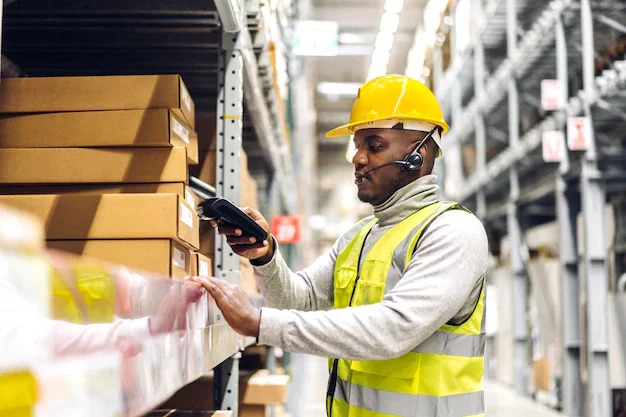 portrait-smiling-african-american-engineer-man-order-details-tablet-checking-goods-supplies-shelves-with-goods-background-warehouse-logistic-business-export_38019-2062